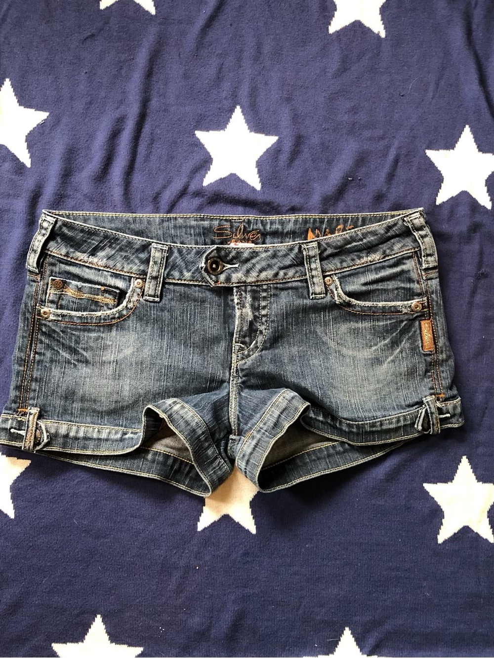 Low rise silver mini shorts